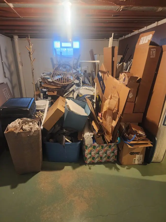 Roll-off dumpster container at job site for 2 Yard Dumpster Rental in Lisbon